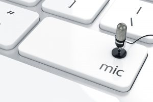 3d render of microphone icon button on keyboard with soft focus